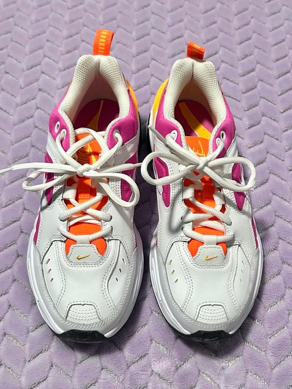 Nike Women’s M2K Tekno trainers in white, hot pink and orange.
